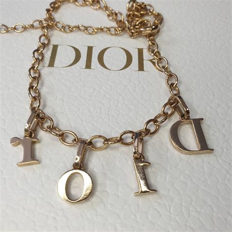 silver dior letter necklace|Dior necklace letters and names.